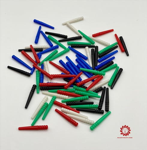 A pile of multi-colored scorekeeping pegs.